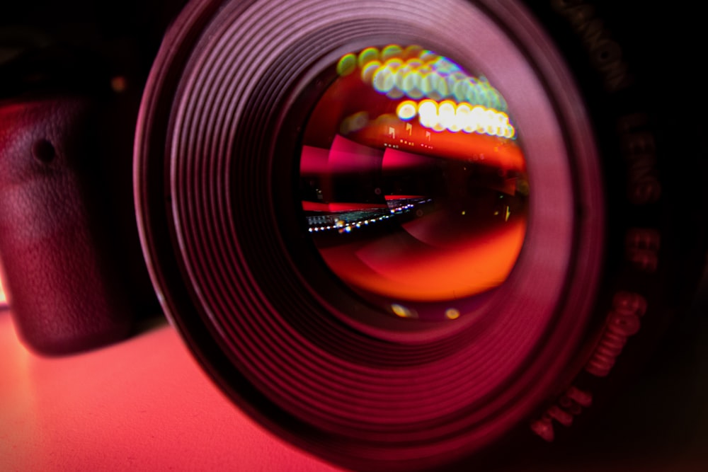 a close up of a camera lens on a table