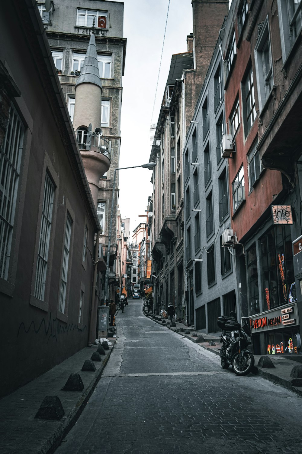 a motorcycle parked on the side of a street