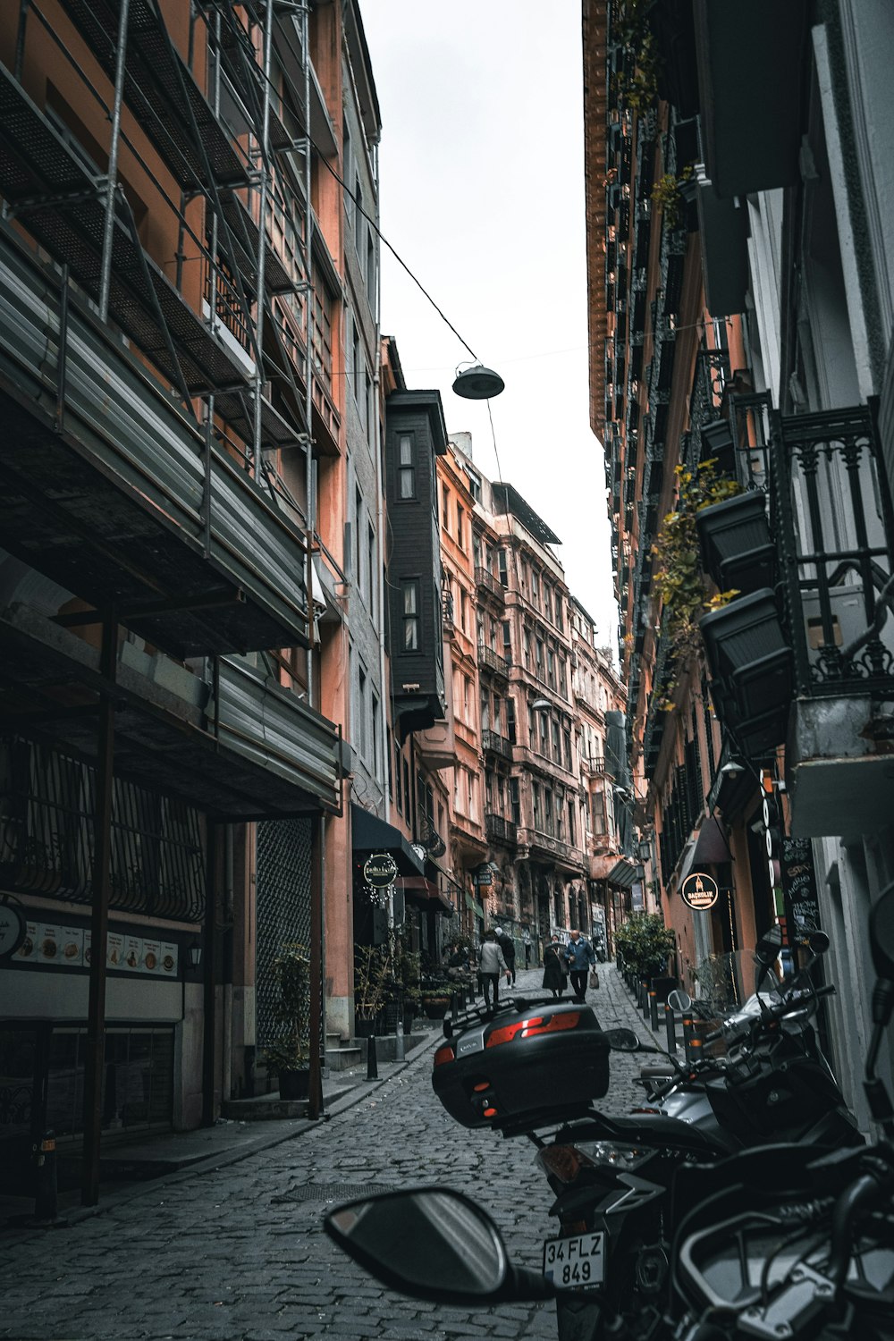 a city street filled with lots of tall buildings