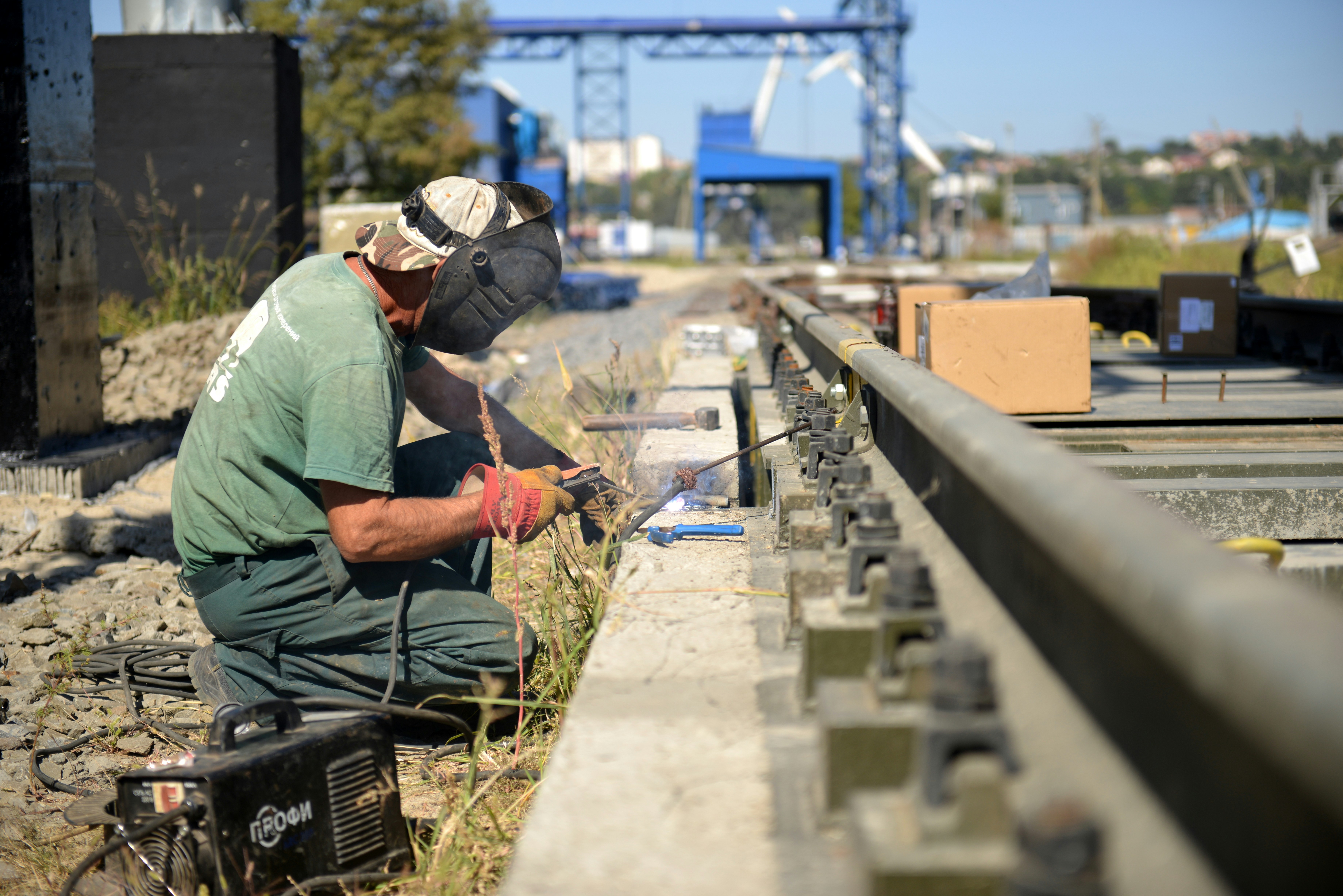 a man working on a rail road track