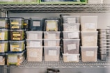 a shelf filled with containers and containers of food