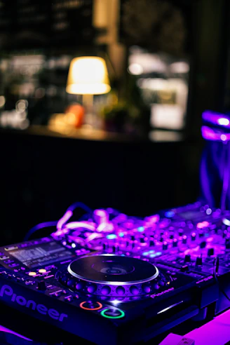 a dj controller sitting on top of a table