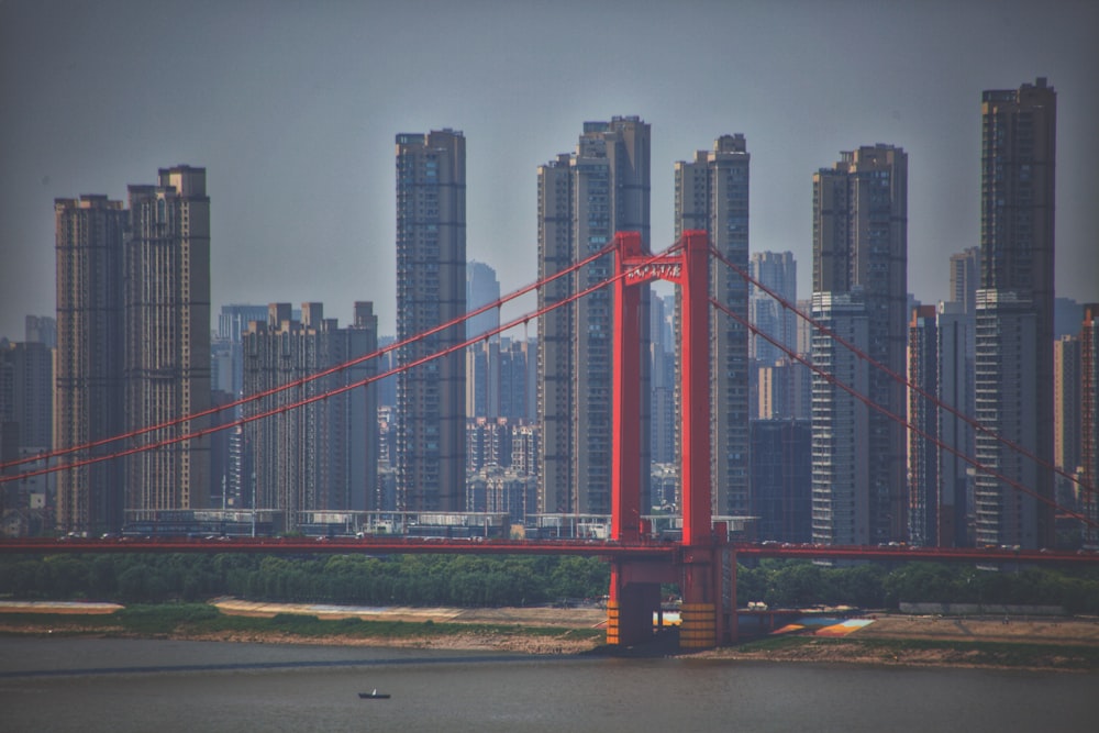 a bridge with a city in the background