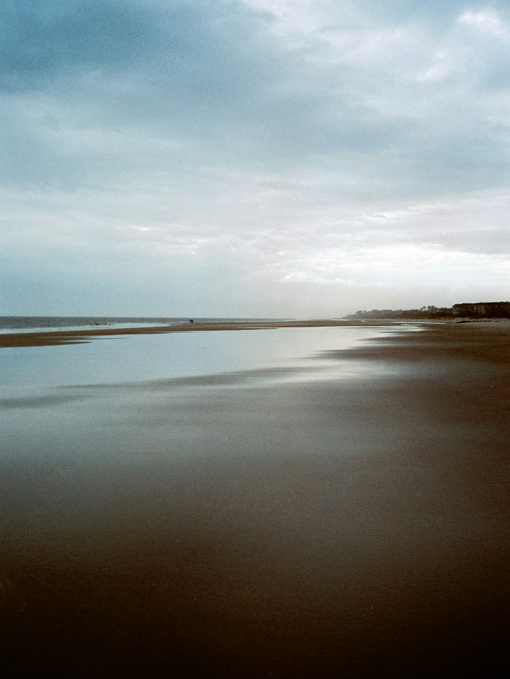 a view of the ocean from a beach