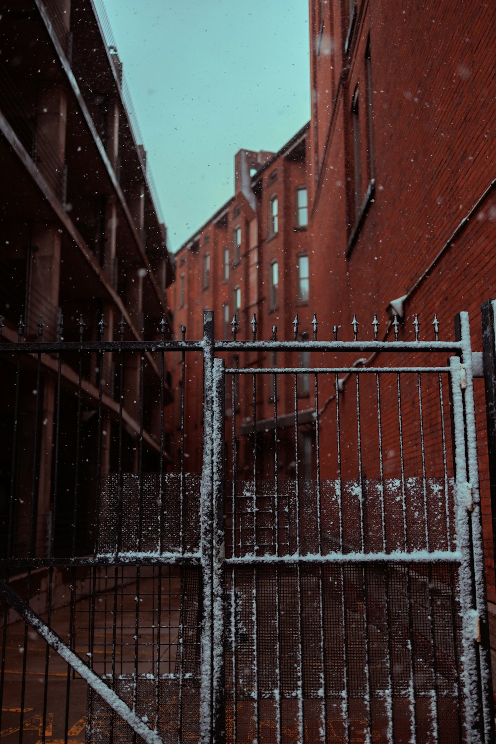 a gate that is next to a building