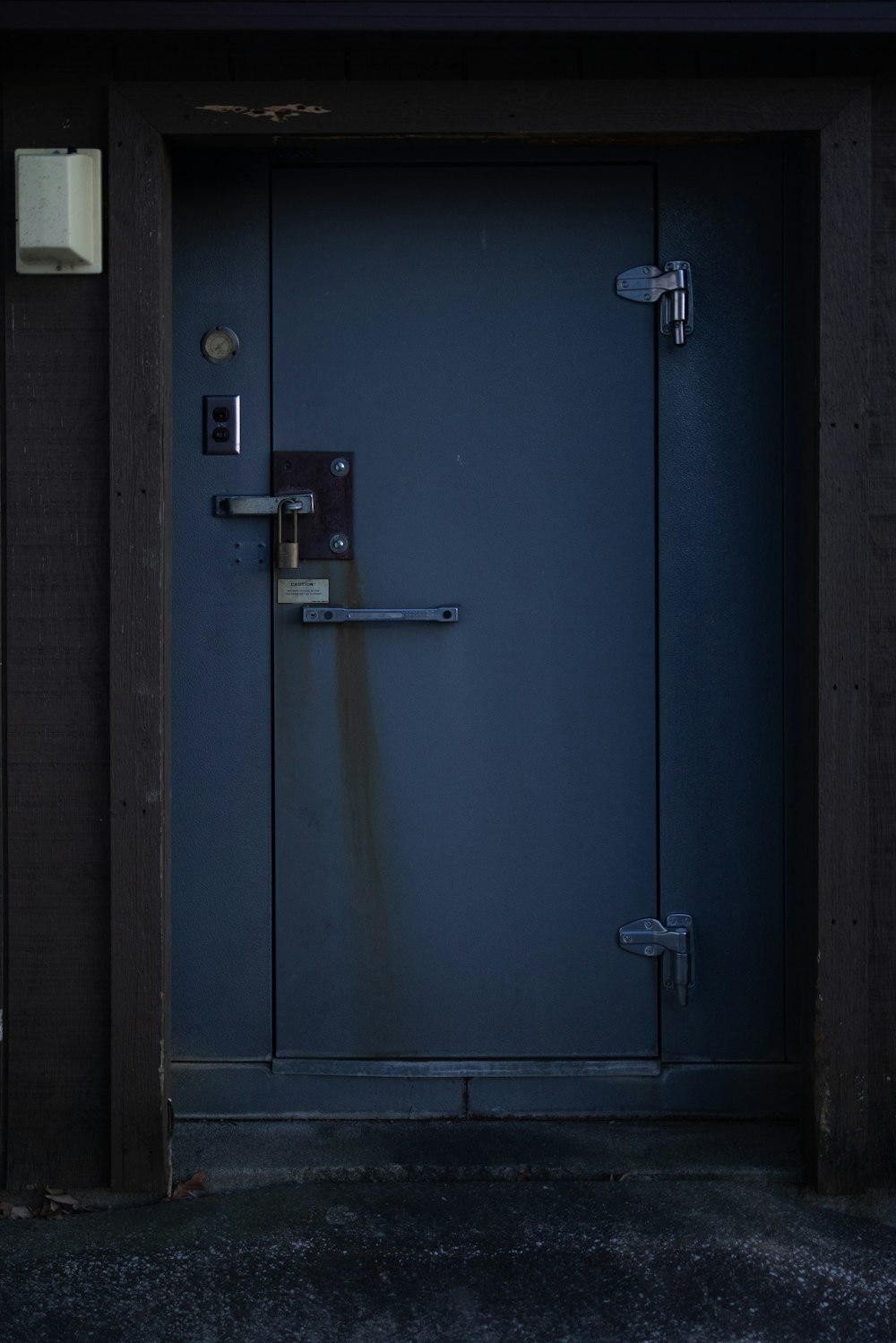 a blue door with a handle on it