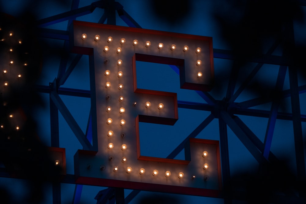 a lit up sign that says e is for e