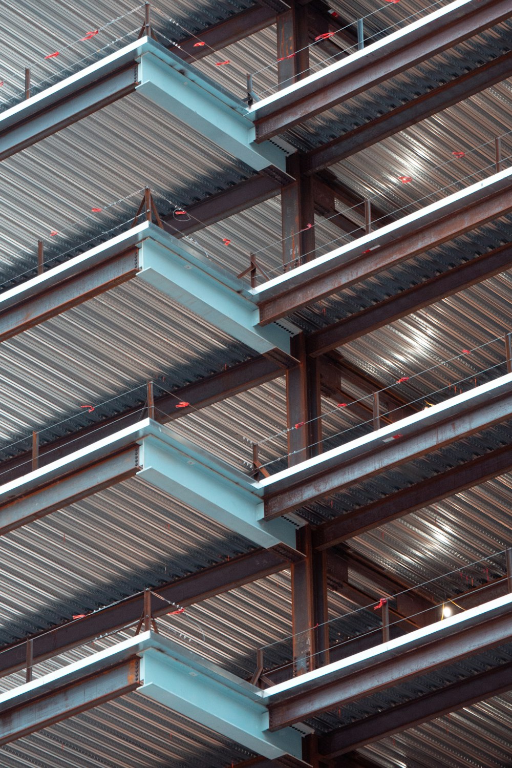 a close up of a building with metal beams