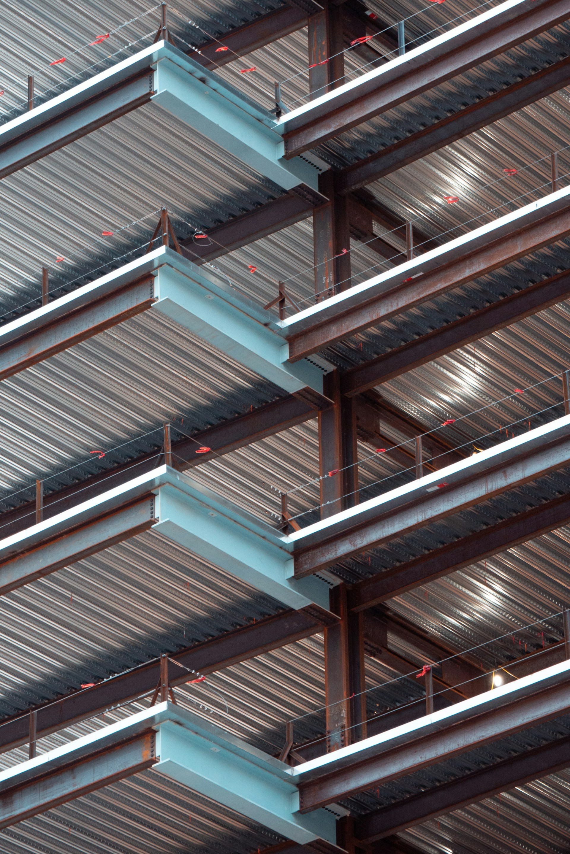 a close up of a building with metal beams