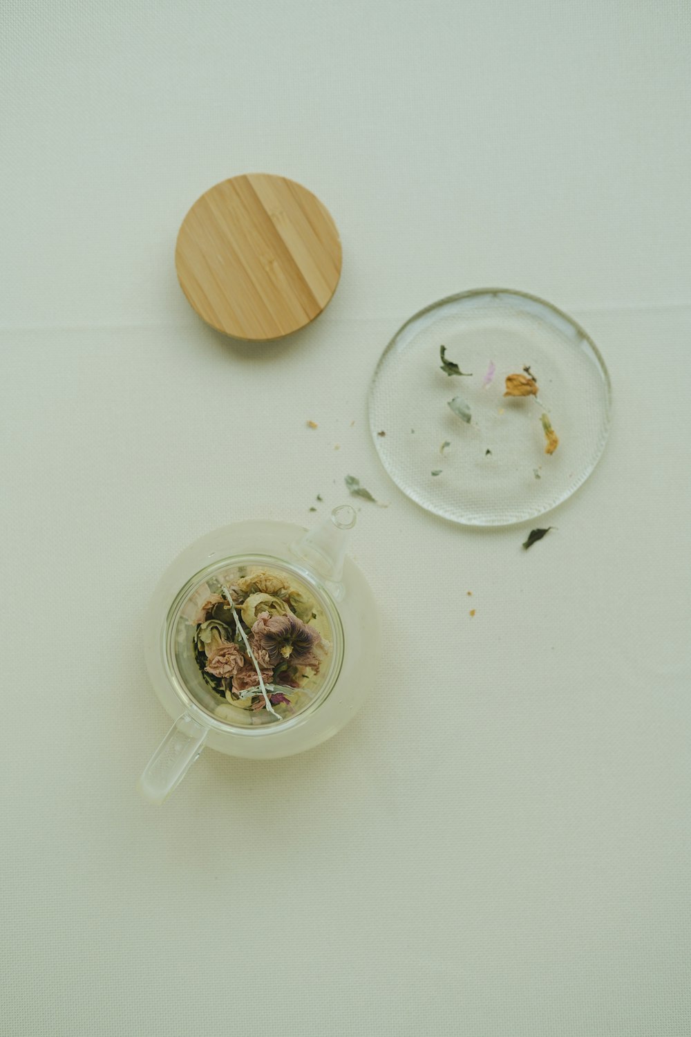 a bowl of food and a plate of food on a table