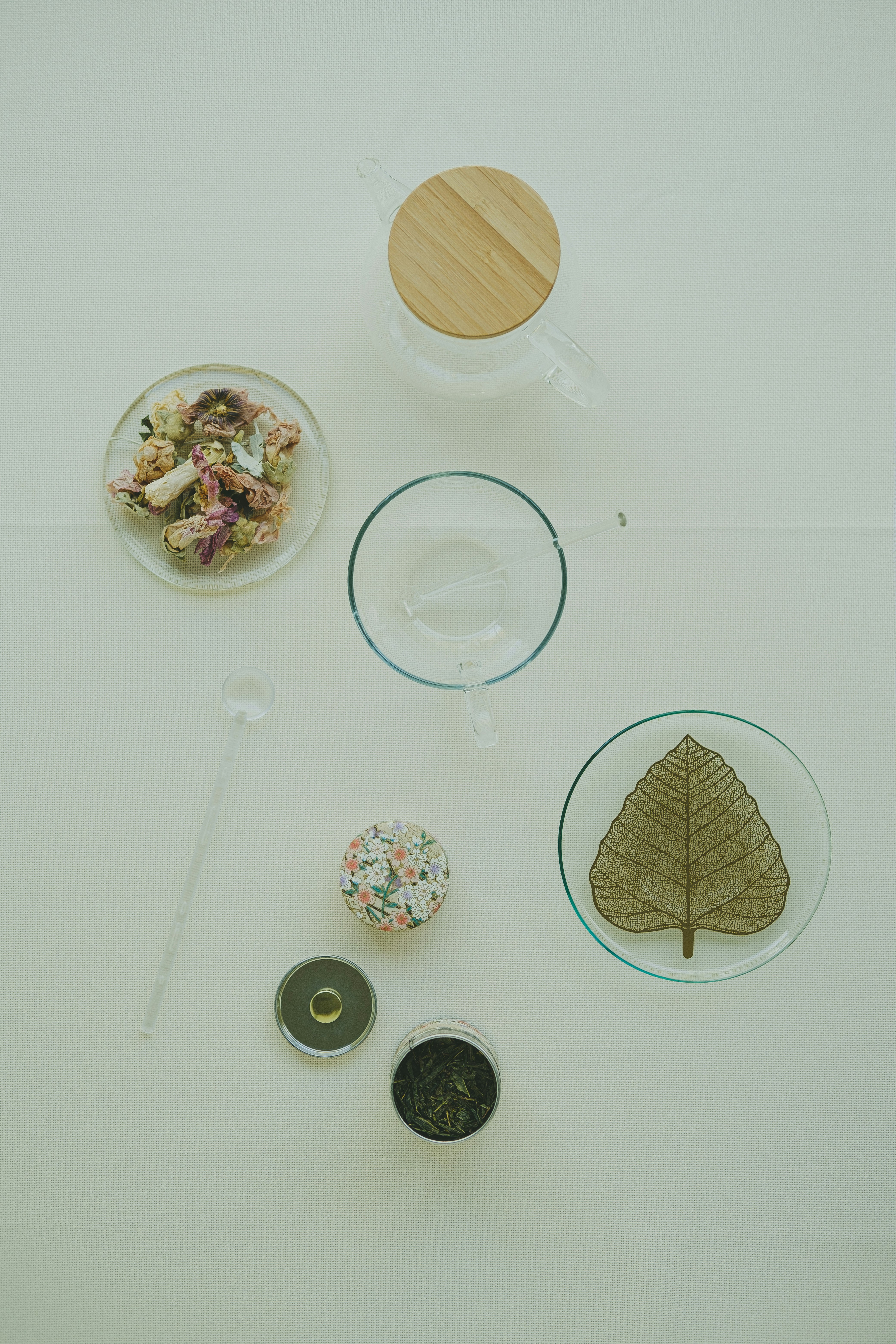 a table topped with plates and bowls filled with food