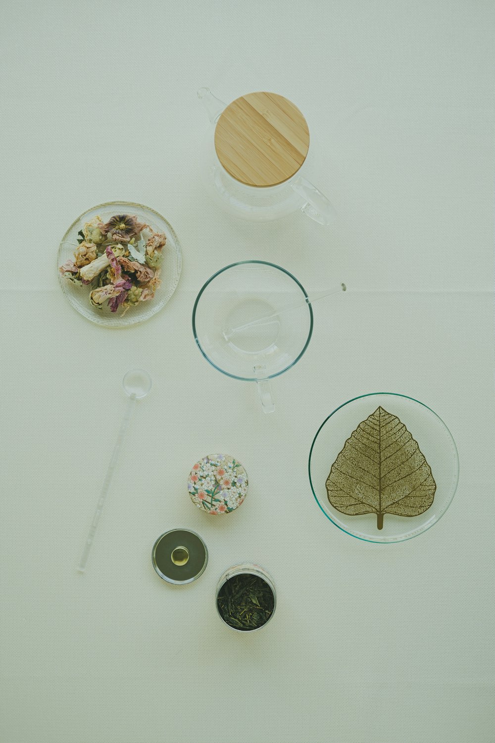 a table topped with plates and bowls filled with food