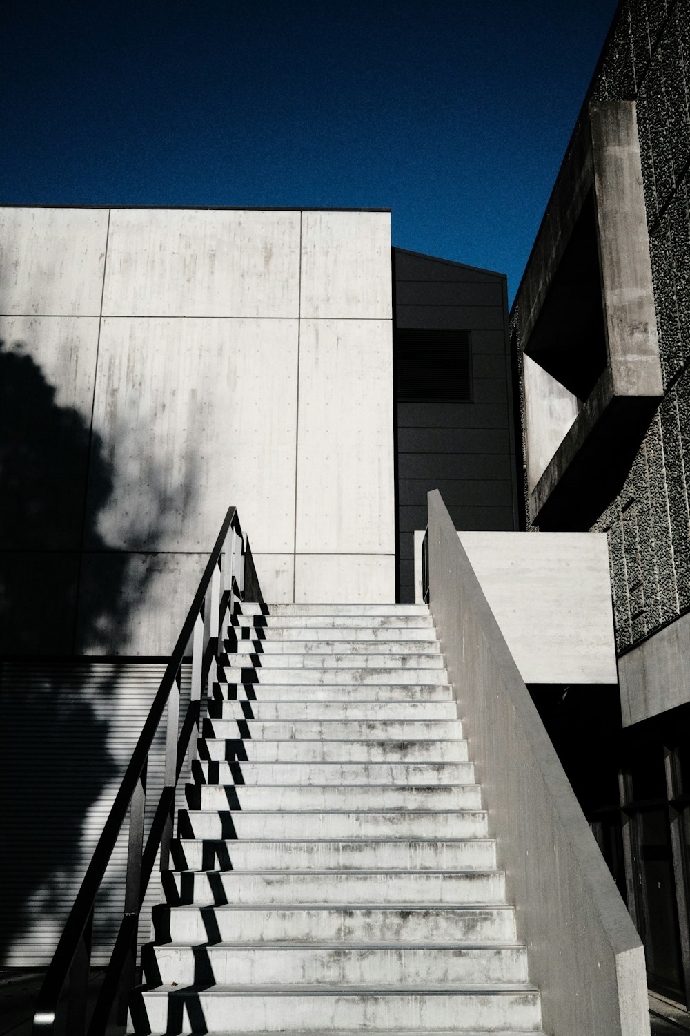 a person riding a skateboard down a set of stairs