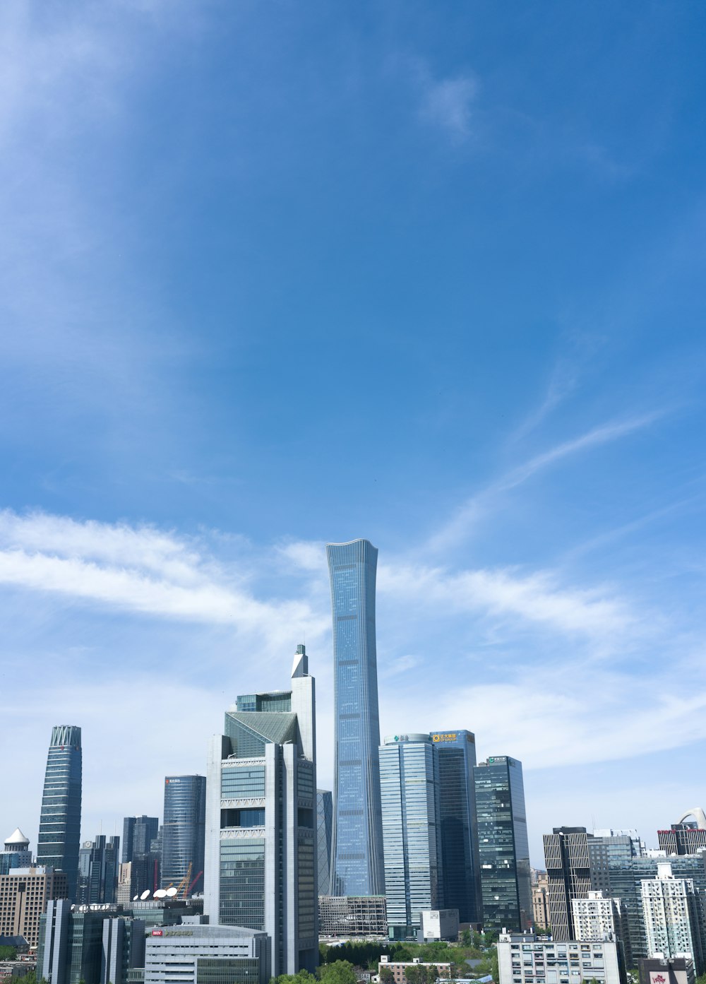 a view of a city with tall buildings