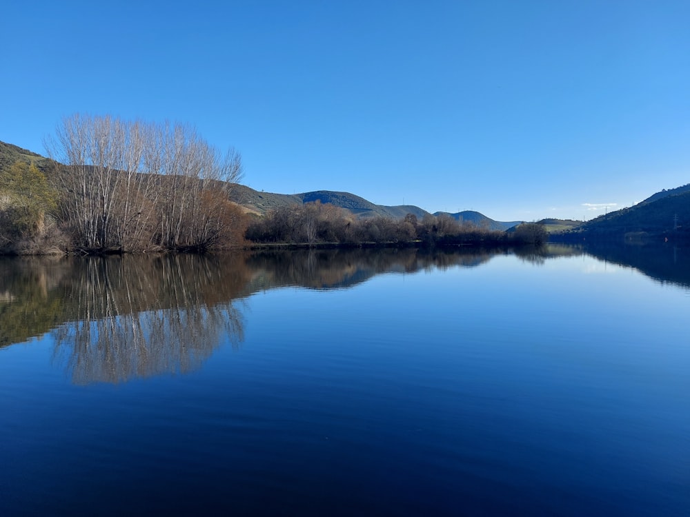 a large body of water surrounded by mountains