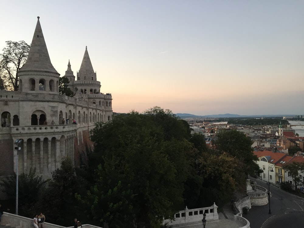 a view of a castle from a hill