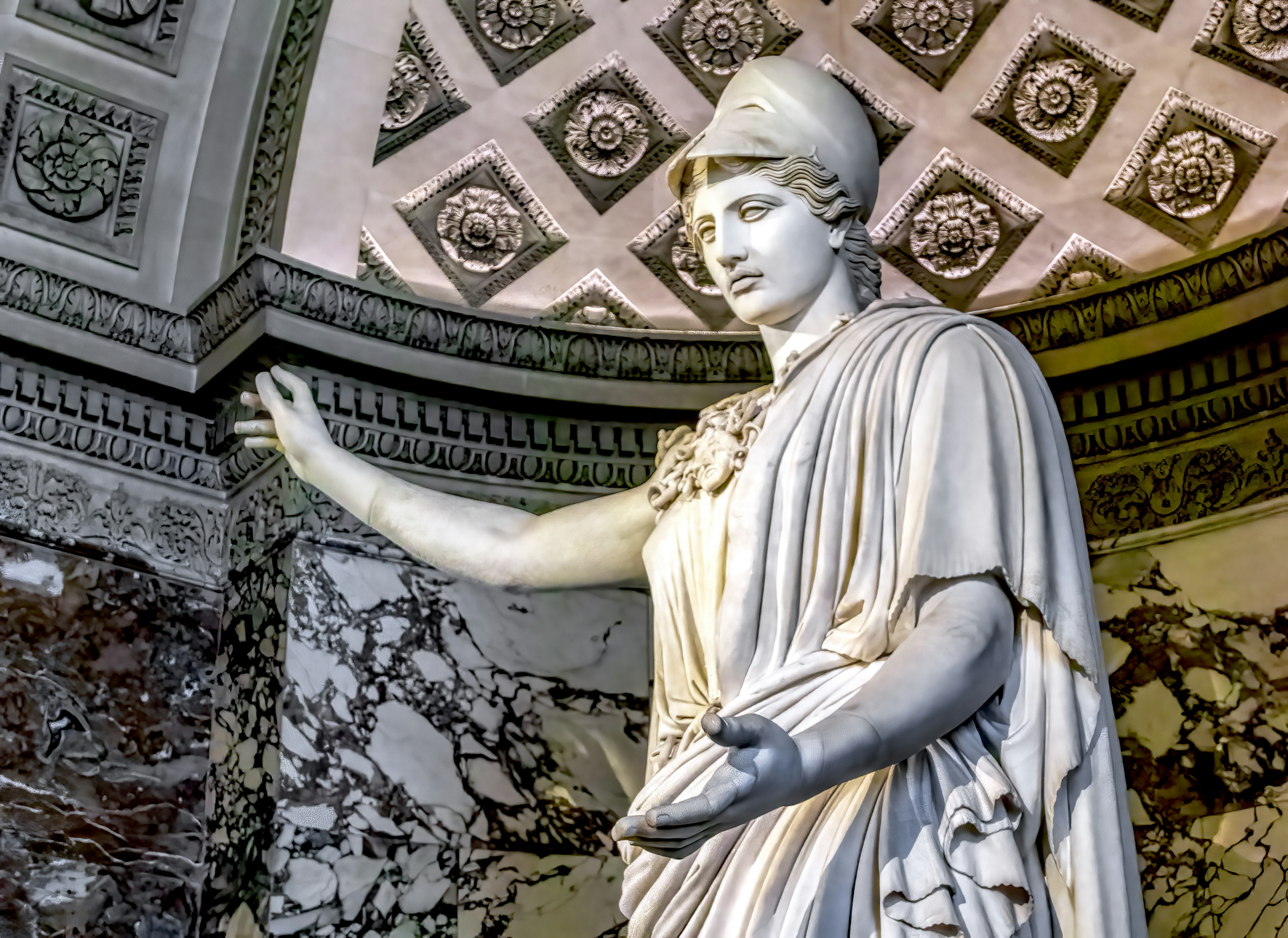 a statue of a woman in a white dress