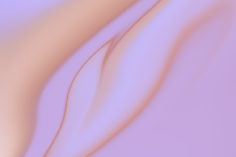 Una imagen borrosa de un fondo púrpura claro