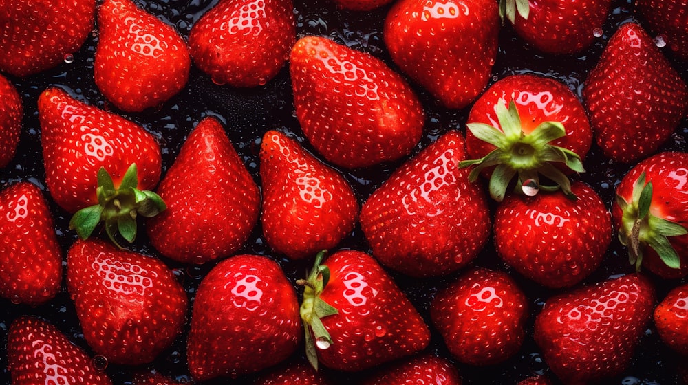 a group of strawberries sitting on top of a table