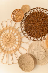 A stylish magazine rack made of rattan.