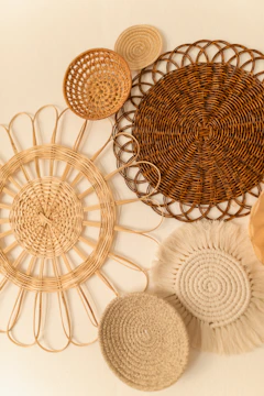A stylish magazine rack made of rattan.
