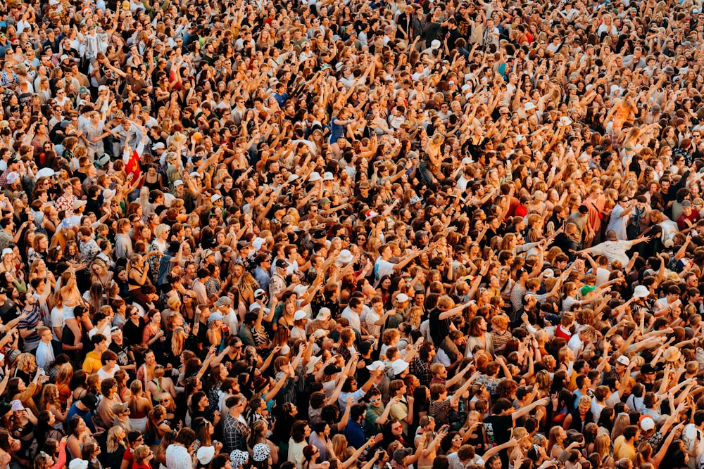 a large group of people are standing together