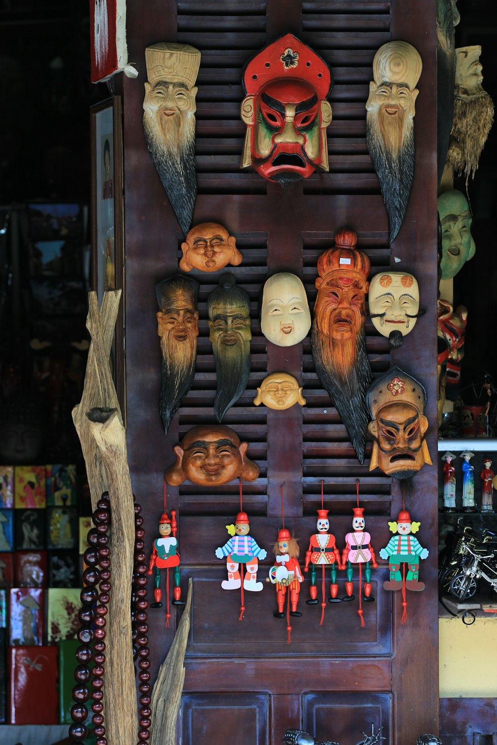 a display of masks on a wall in a store