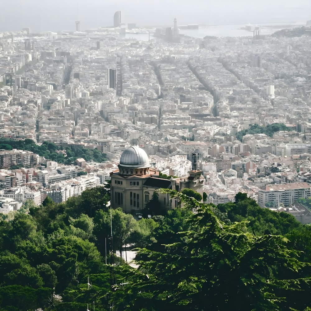 a view of a city from the top of a hill