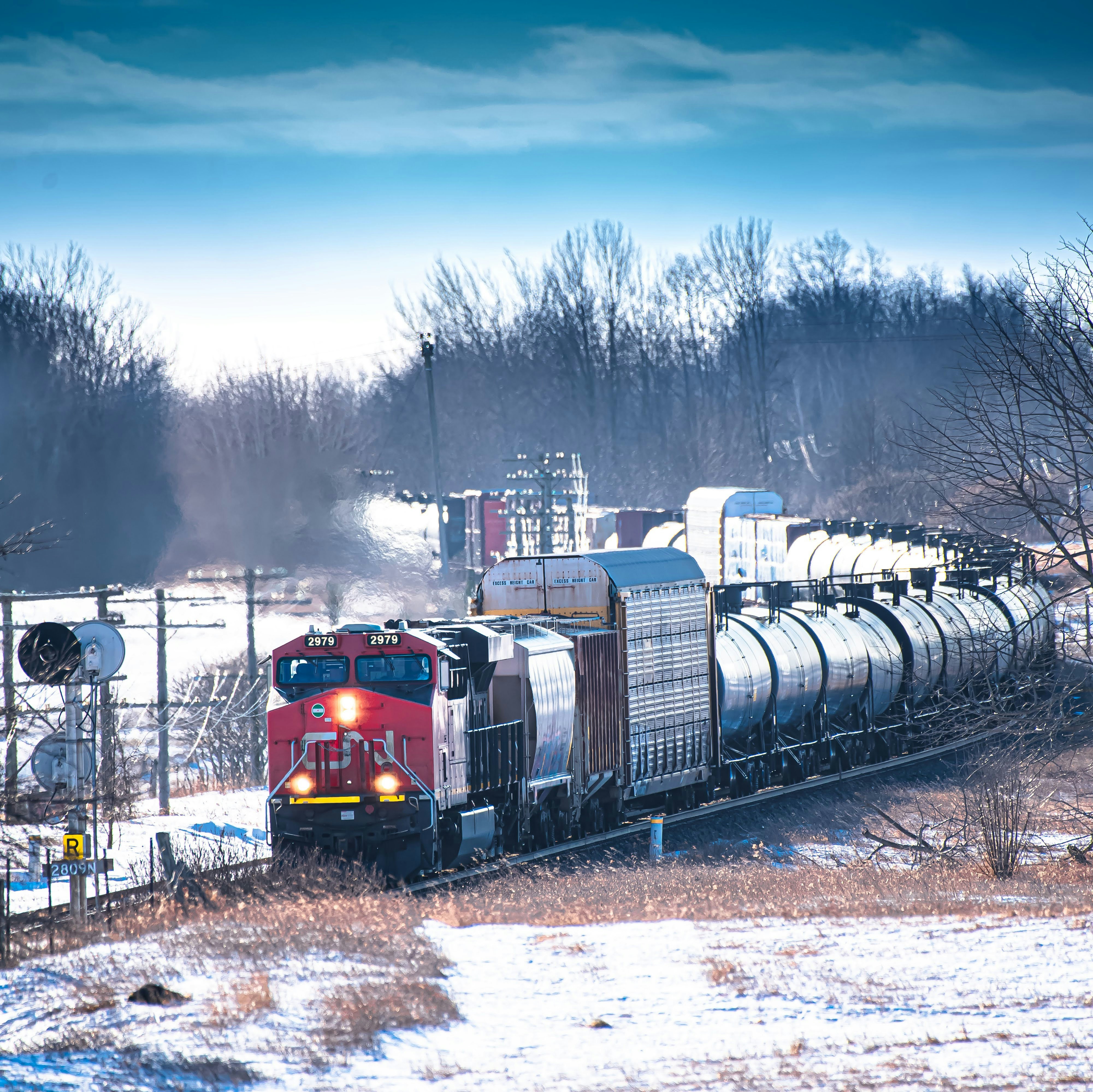 a train traveling through a rural country side