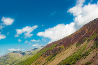 A scenic view of Mount Kenya with a clear blue sky.