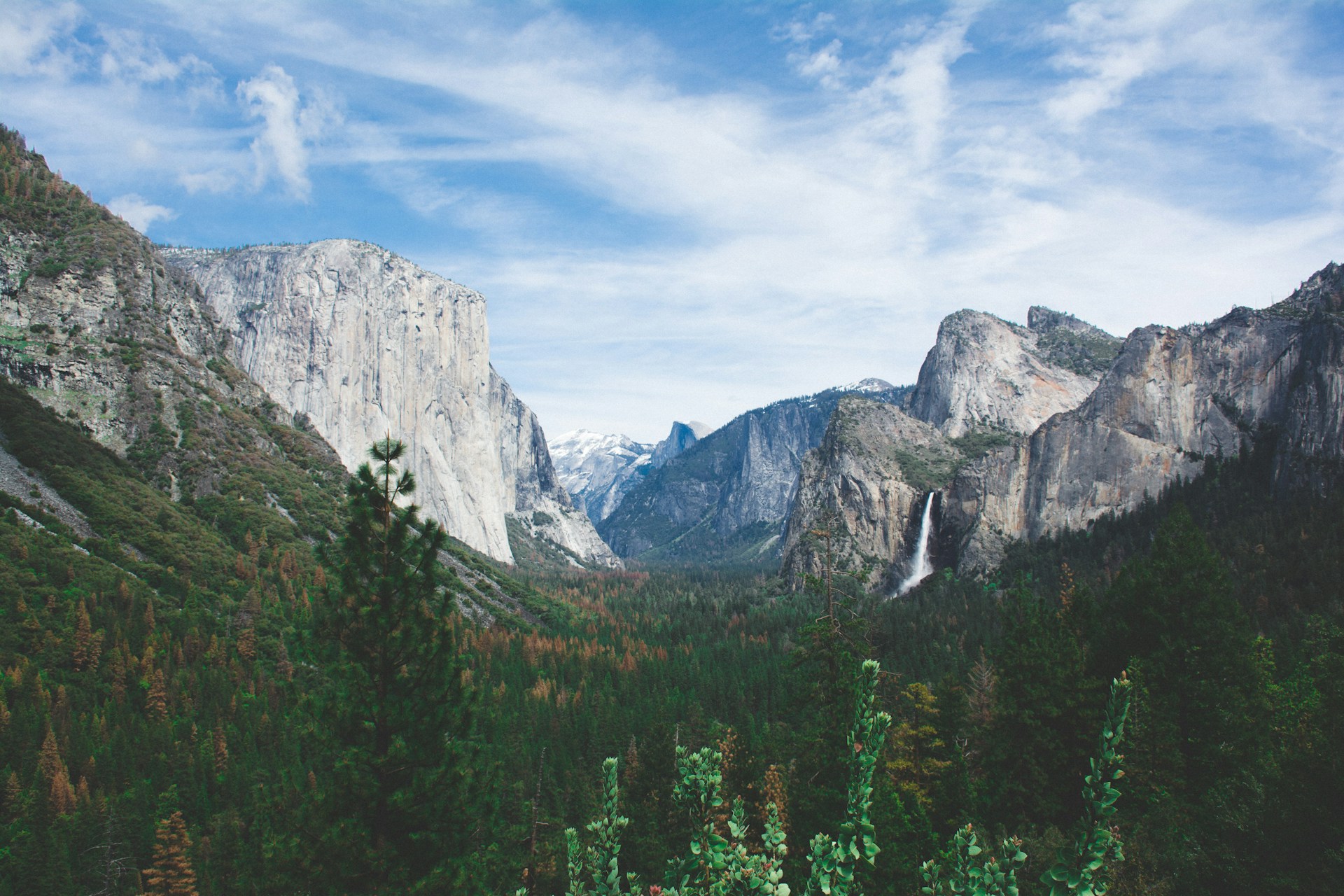 A breathtaking landscape showcasing the nearby Soochipara waterfalls cascading down rocky cliffs.