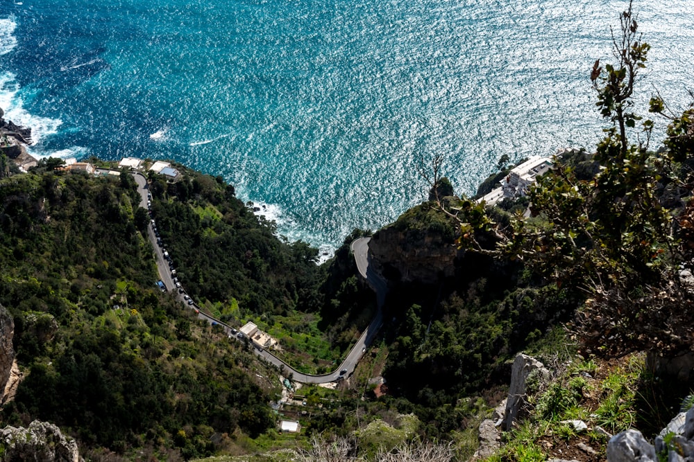 a scenic view of the ocean from the top of a hill