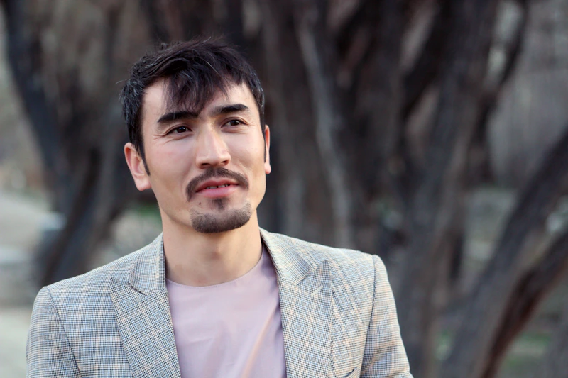 charming mature man in a suit outdoors