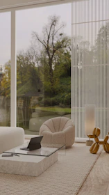 A serene modern living space showcasing harmonious balance between digital gadgets and natural elements.