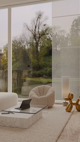 A sleek, modern living room with floor-to-ceiling windows and natural wood accents.