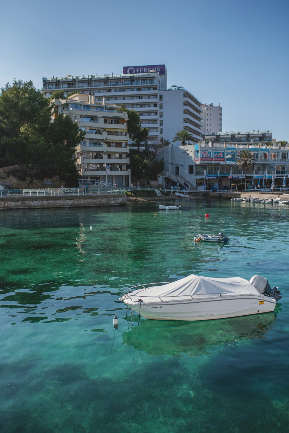 a boat floating on top of a body of water