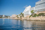a body of water with buildings on the side of it