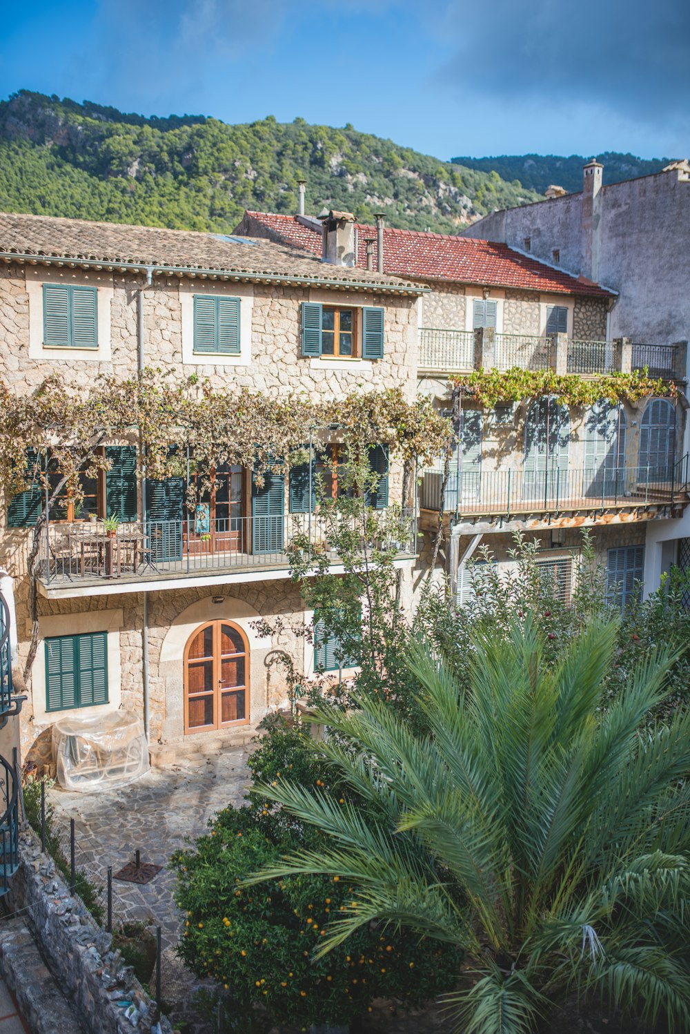 a stone building with a balcony and balconies