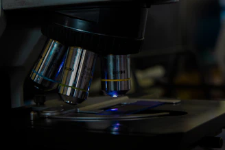 a close up of a microscope on a table