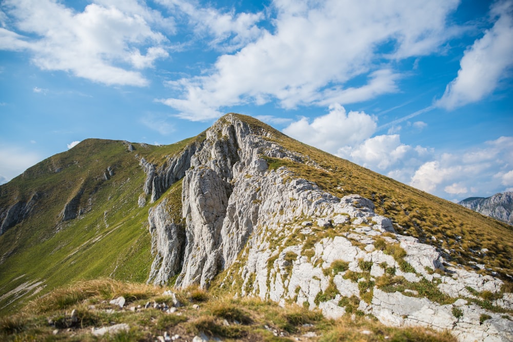 a mountain with a very tall rock face