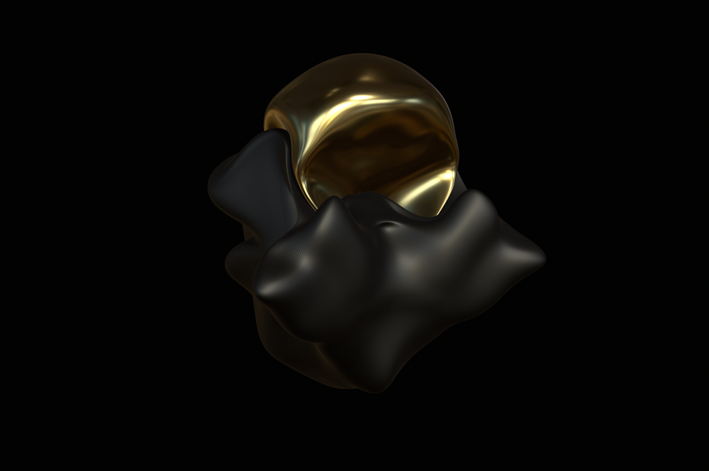 a black and gold object with a black background