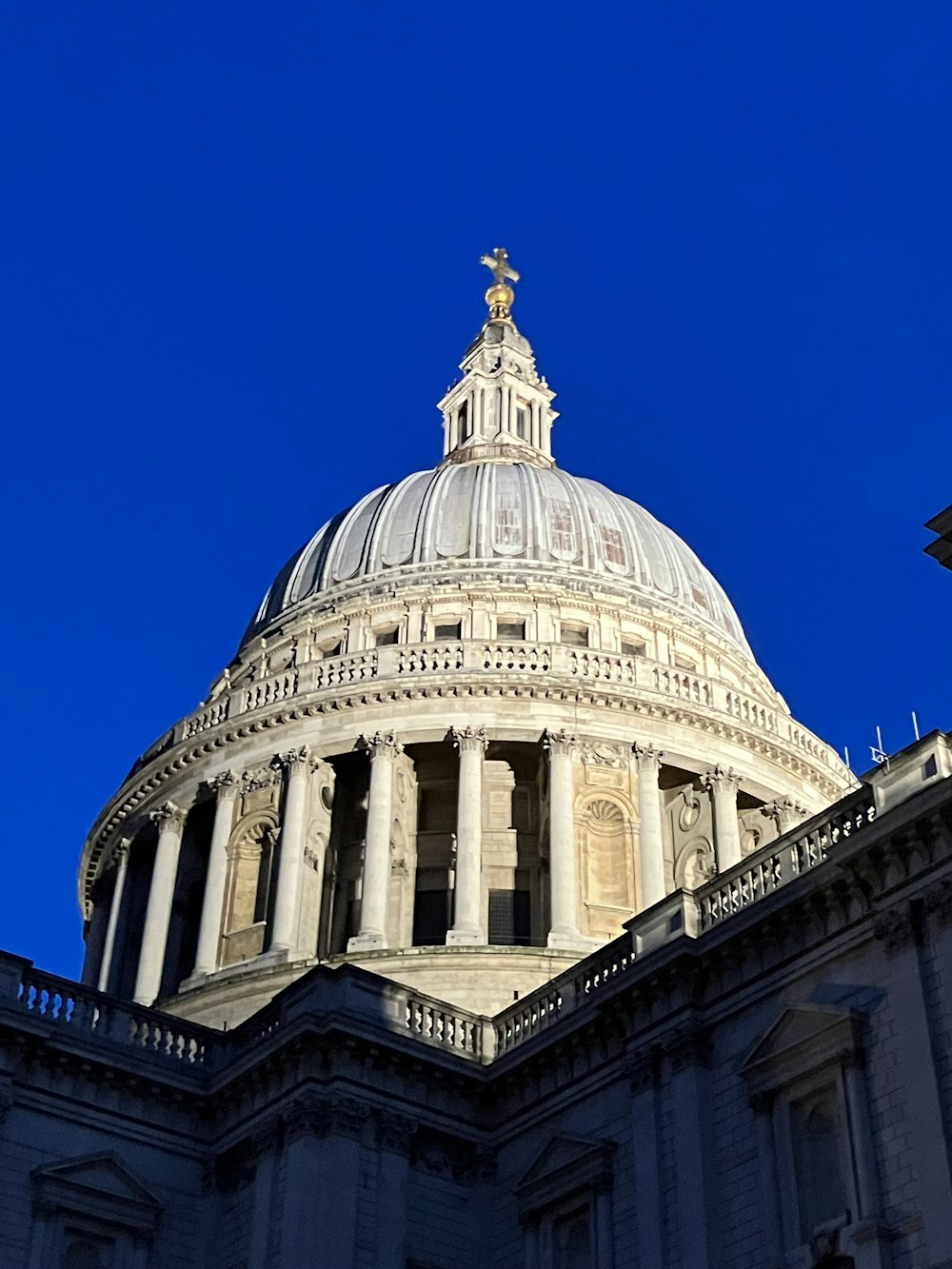 the dome of a building with a clock on it