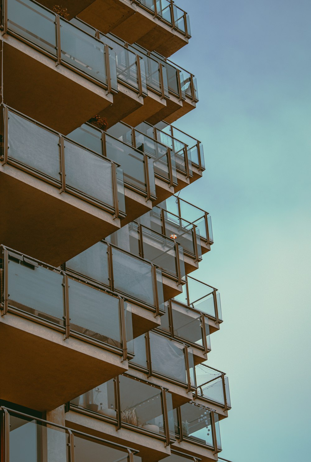 a tall building with balconies and balconies on the balconies