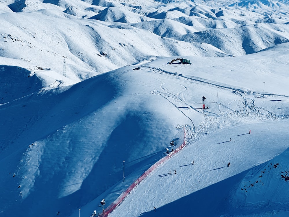 a snow covered mountain with a ski slope