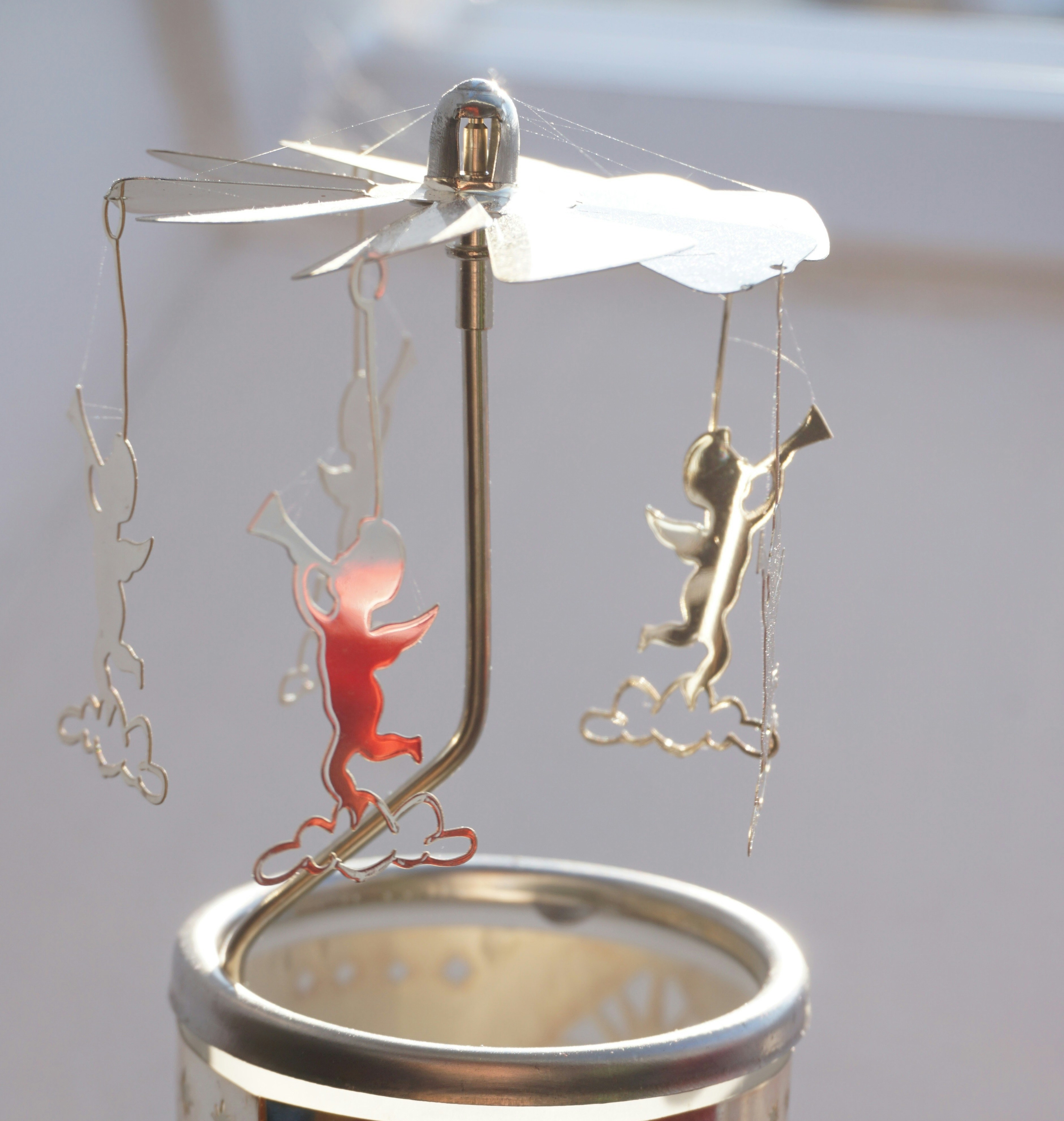 a tin can with a dragon on top of it