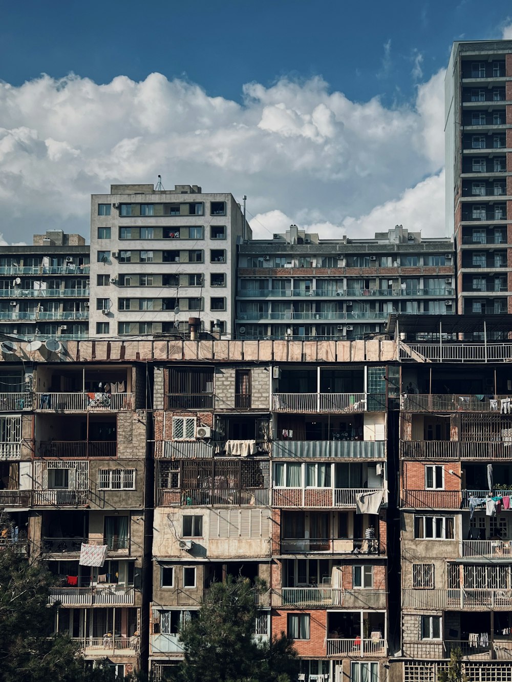 a very tall building with balconies and balconies on it