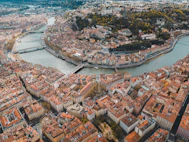 an aerial view of a city with a river running through it