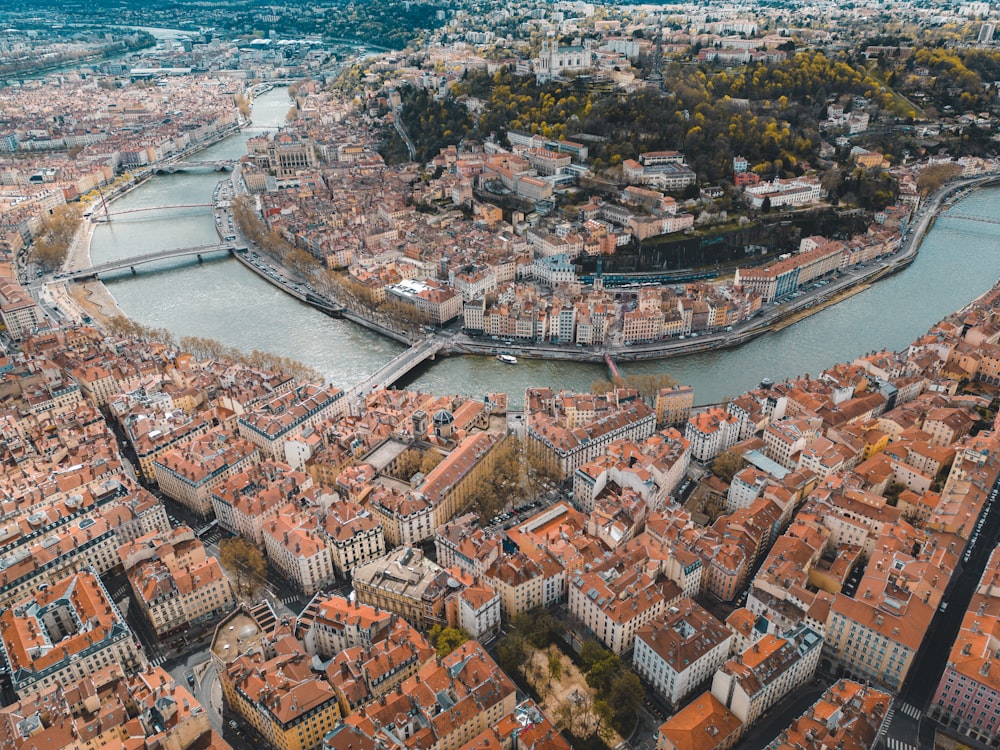 an aerial view of a city with a river running through it