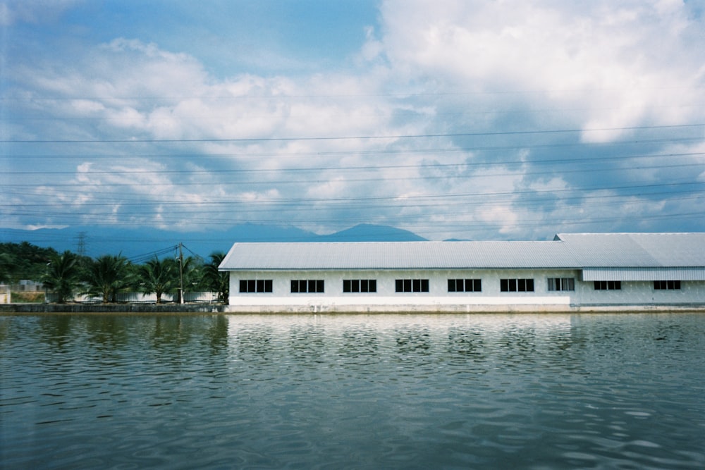 a building sitting on top of a body of water