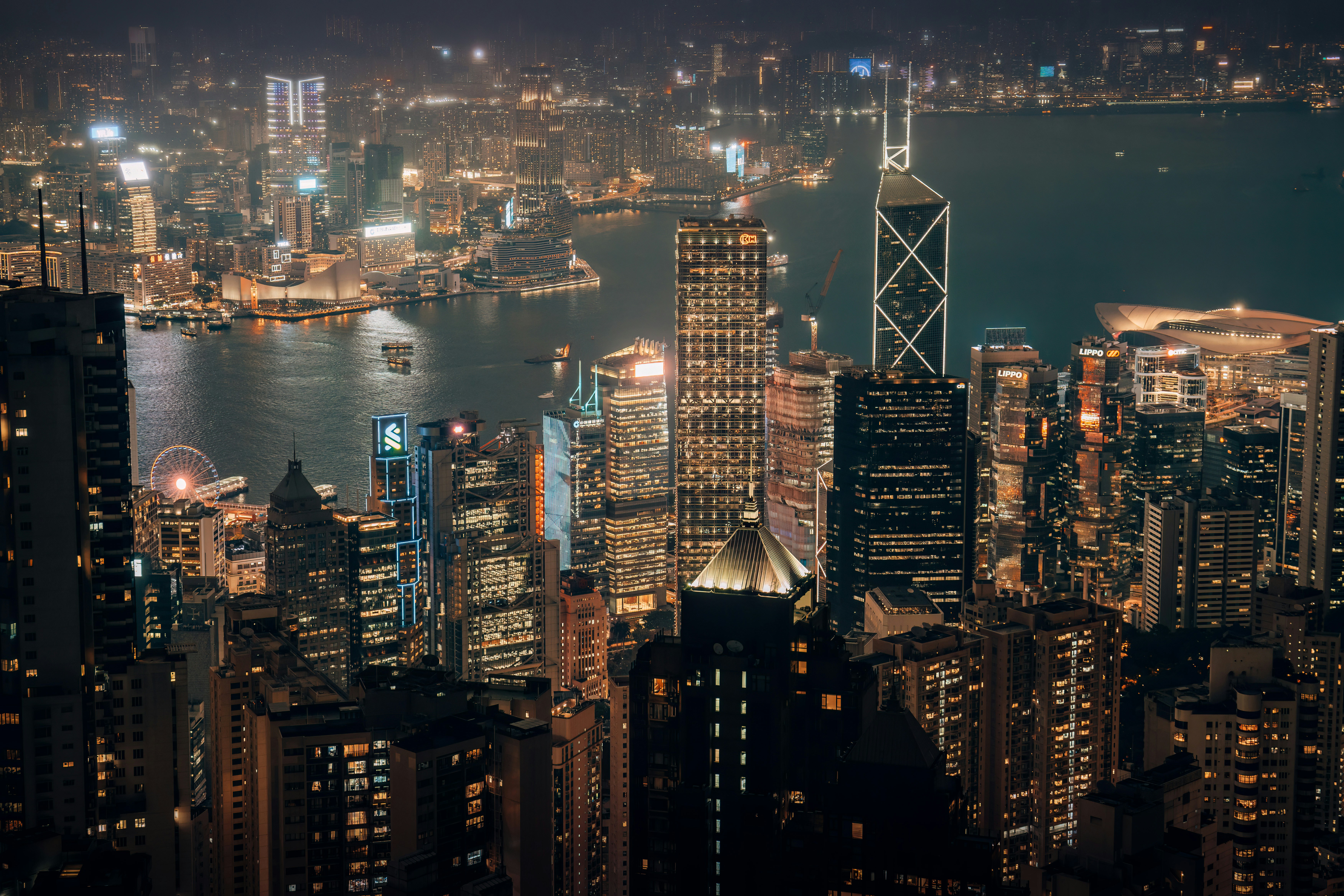 a view of a city at night from the top of a building